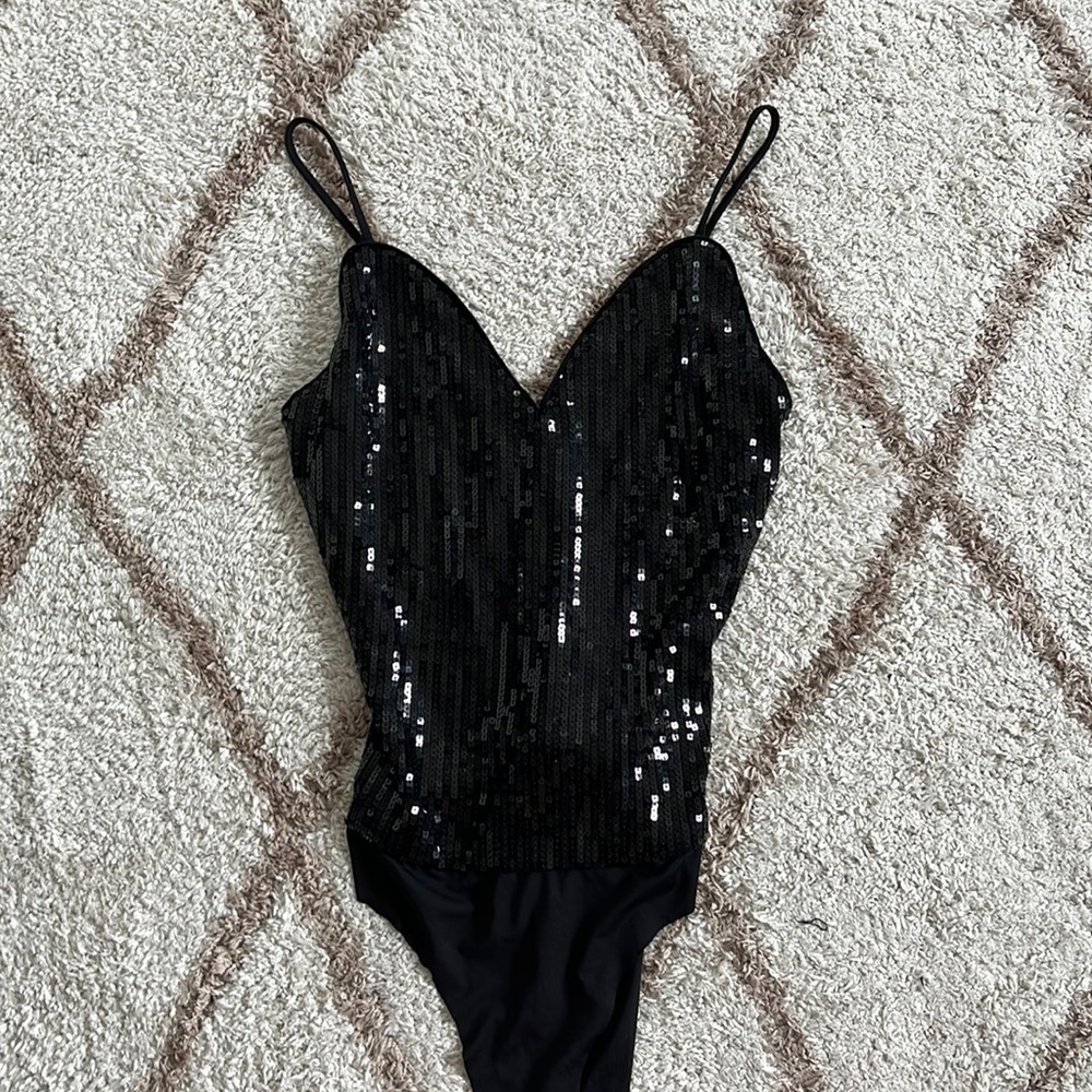 Rue 21 ladies sparkle bodysuit.